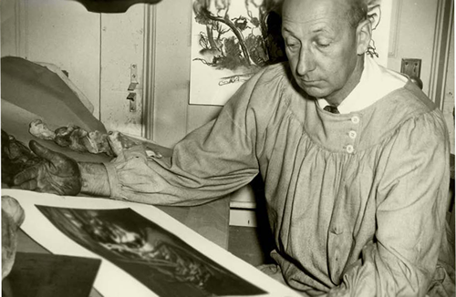 Doel Reed working on a painting Doel Reed working on a painting