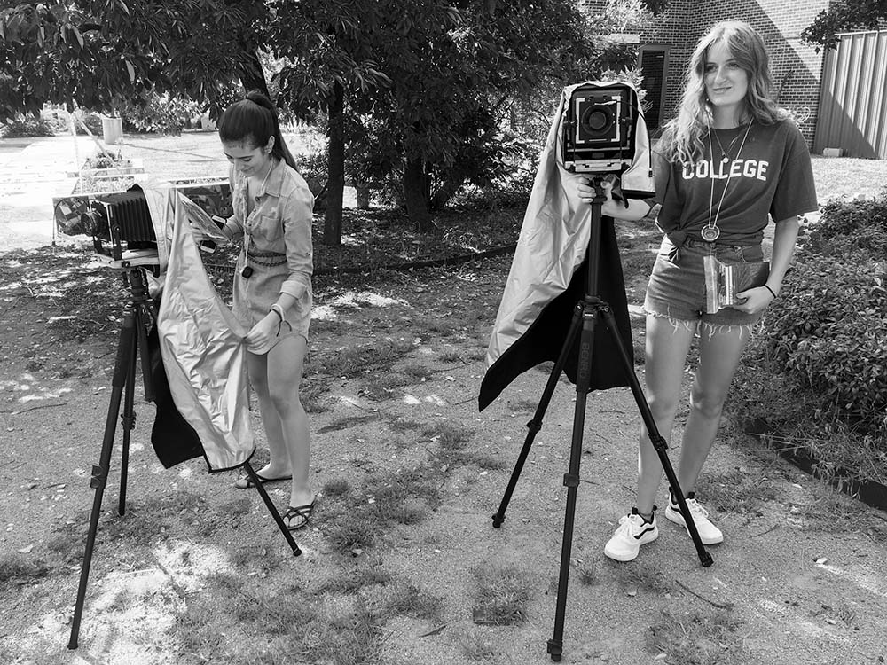 Two students using 4x5 view cameras