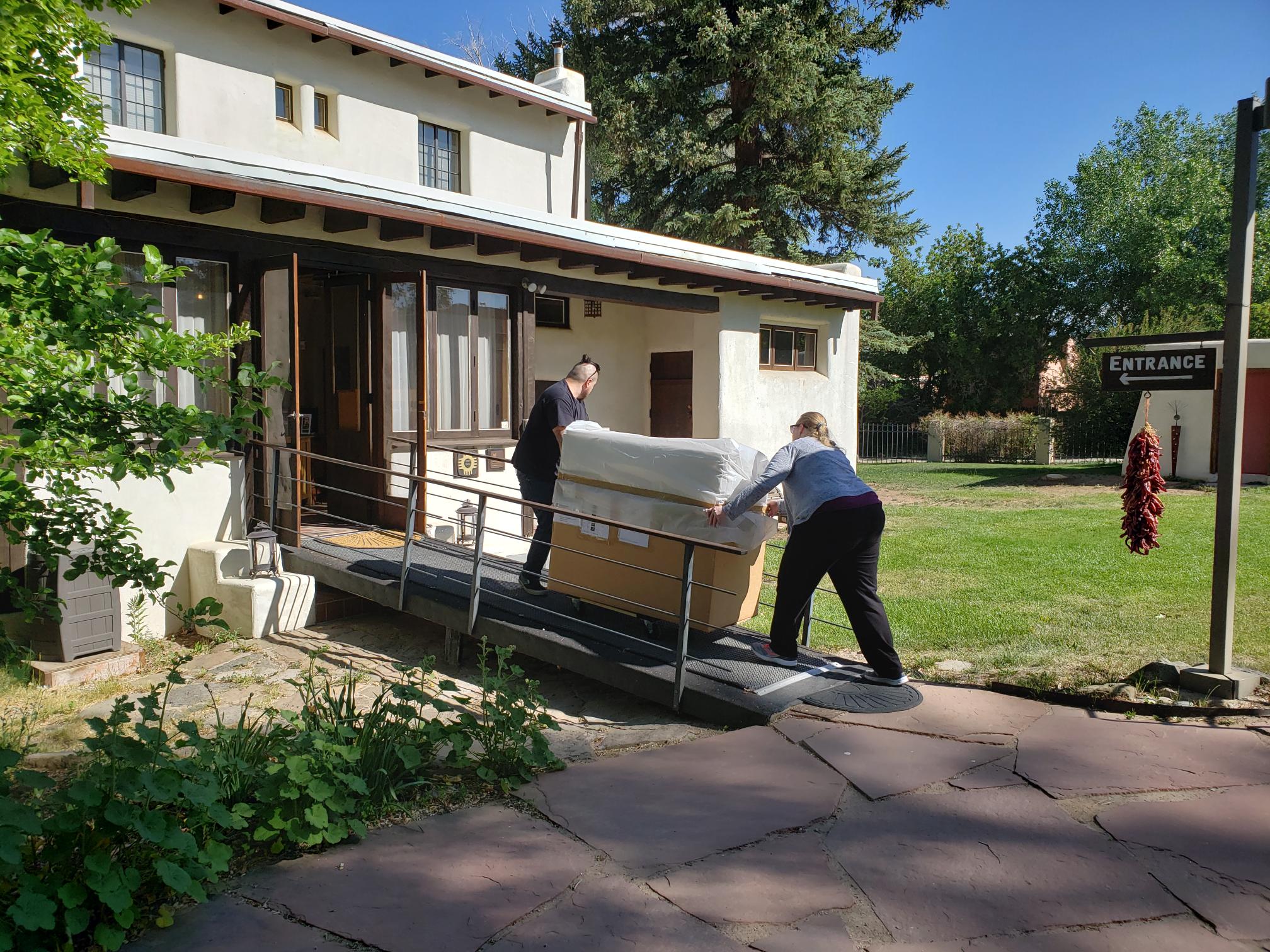 Doel Reed exhibit arriving in Taos