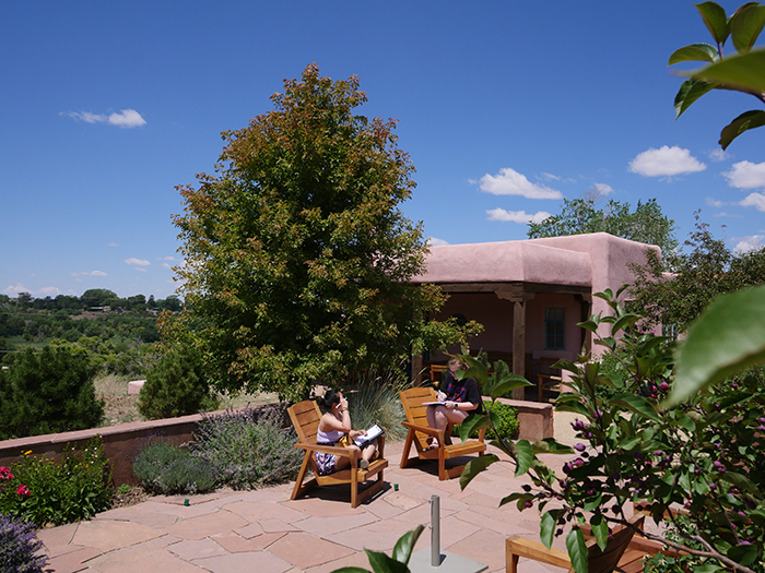 students sitting outside at the Doel Reed Center 