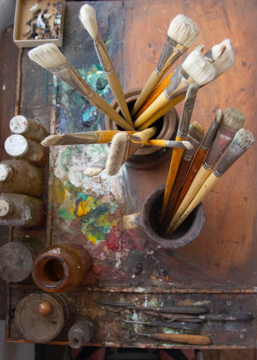 Image of paintbrushes at DRC in Taos